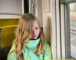 Karis was going on 3-4 hours of sleep and major jet lag. This was in the morning before we finished the last train stop and made it to our destination.