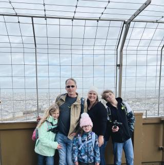 Eiffel Tower family portraits are a must if you are going to endure the pain of those stairs.

Sarah opted for the pass that had elevators only after you get to the second level.

That's some diabolical upselling.
My legs hurt just walking up the subway steps the next day thinking about this climb.
