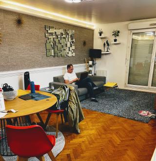 Our digs. Been working this part of the trip, and that's me plugging away.