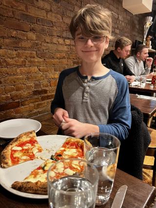 Another happy kid at Don Antonios in New York. At the time, I felt the entire trip to New York was worth that pizza it was so good. Gluten free magic was on that plate.
