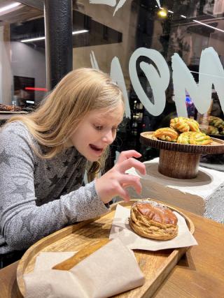 Karis is ready to devour this delicious chocolate croissant.