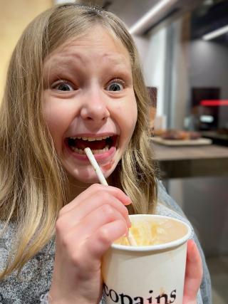 Delighted at the hot chocolate, caramel, whipcream, and a little shot of coffee. I think the caffeine is kicking in.